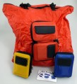 The Mini Magic Bag Expandable Wallet Tote Bag - Red Opened. Yellow & Blue closed.